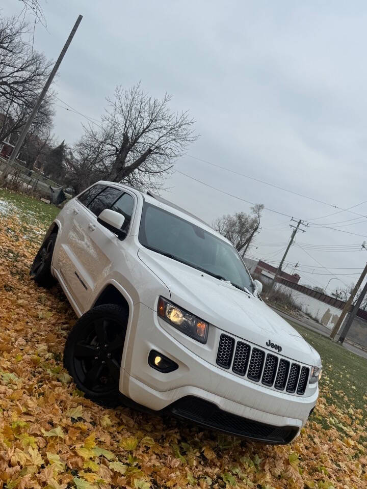 2014 Jeep Grand Cherokee for sale at H & H AUTO GROUP in Detroit, MI