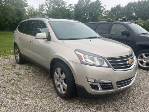 2015 Chevrolet Traverse for sale at HEDGES USED CARS in Carleton MI