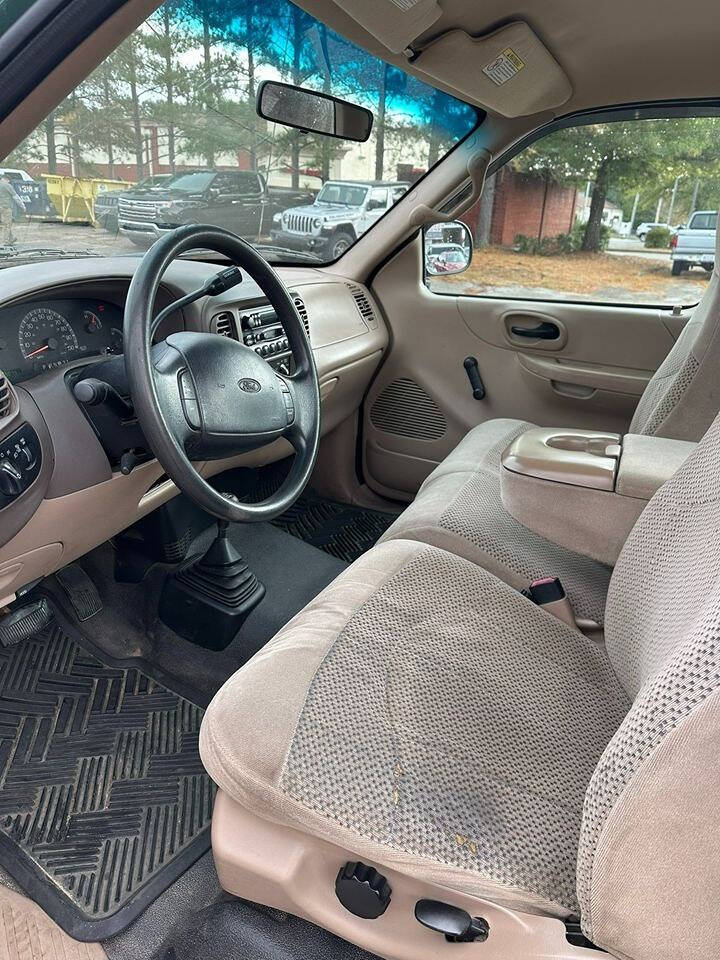 1999 Ford F-150 for sale at A1 Classic Motor Inc in Fuquay Varina, NC