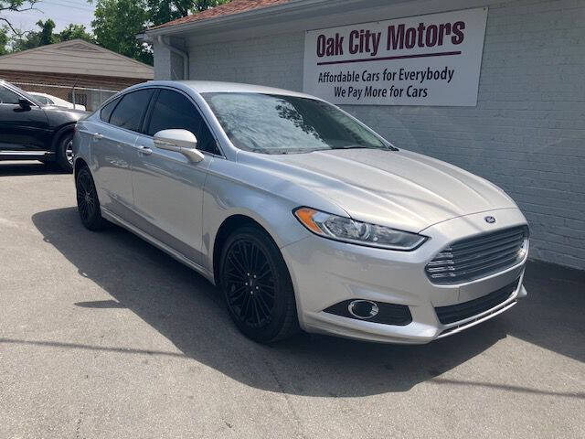 2014 Ford Fusion for sale at Oak City Motors in Garner NC