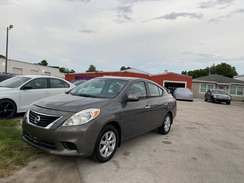 2014 Nissan Versa for sale at ONYX AUTOMOTIVE, LLC in Largo FL