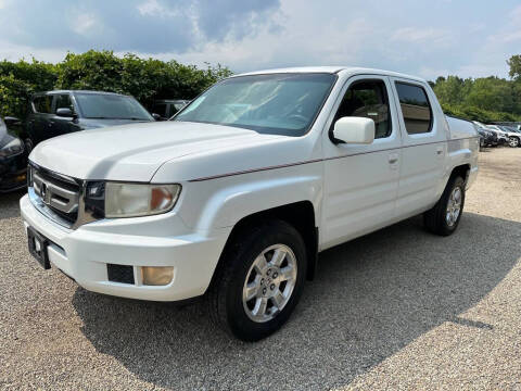 2010 Honda Ridgeline for sale at TIM'S AUTO SOURCING LIMITED in Tallmadge OH