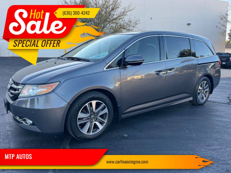 2014 Honda Odyssey Touring's photo