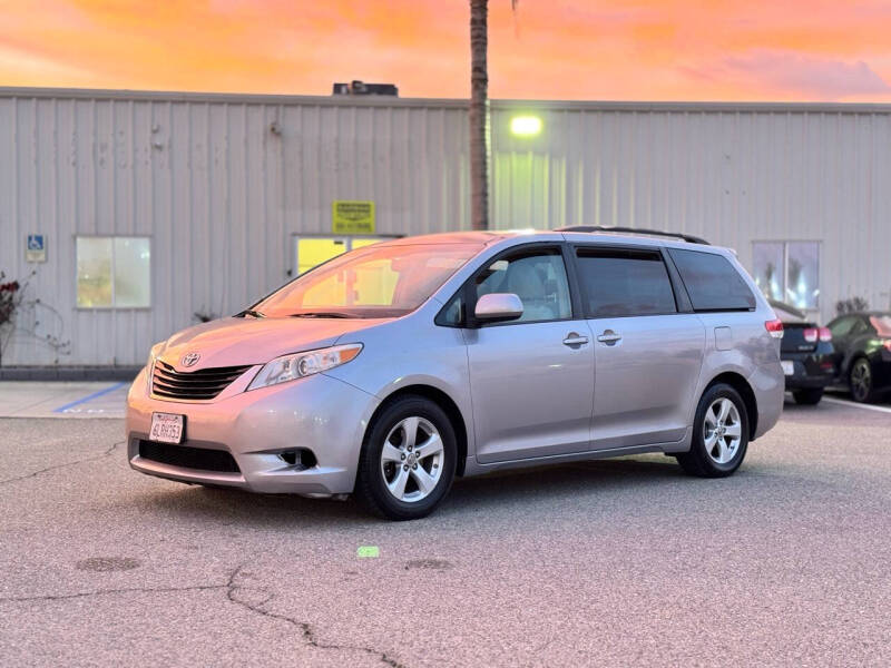 2011 Toyota Sienna for sale at BARMAN AUTO INC in Bakersfield CA