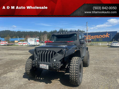2011 Jeep Wrangler for sale at A & M Auto Wholesale in Tillamook OR