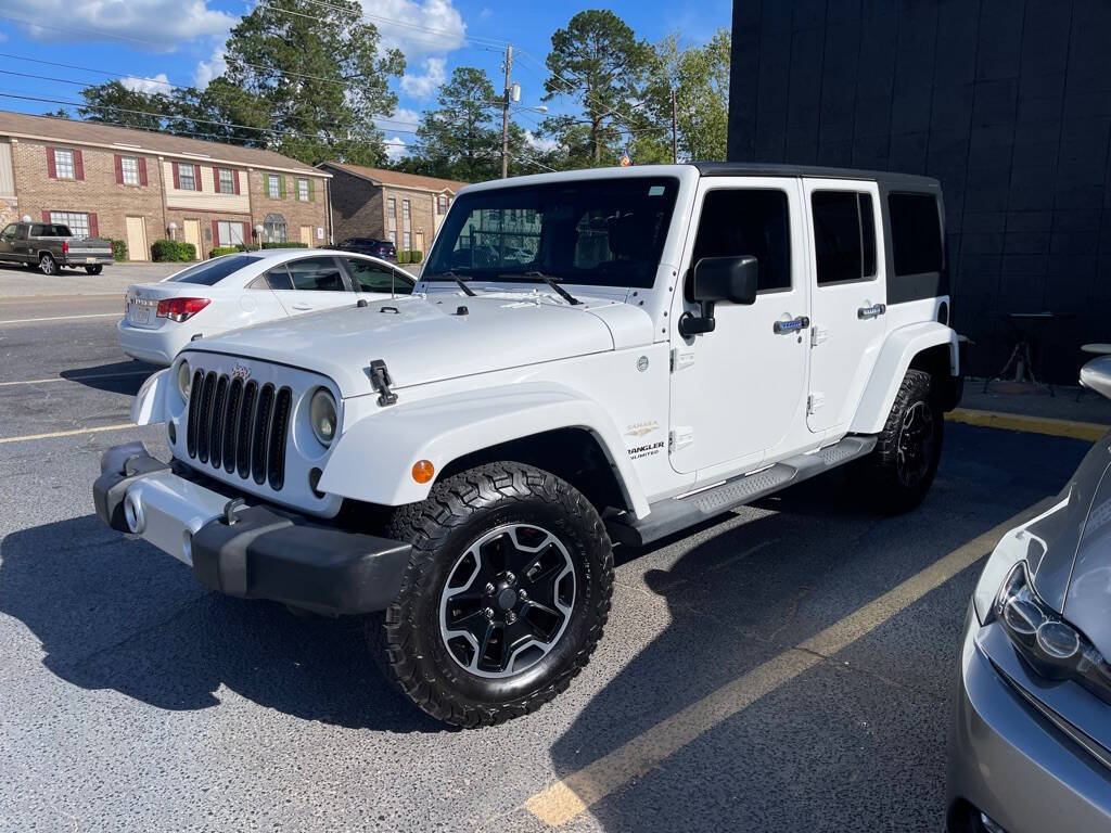 2012 Jeep Wrangler Unlimited for sale at INTEGRITY AUTO in Dothan, AL