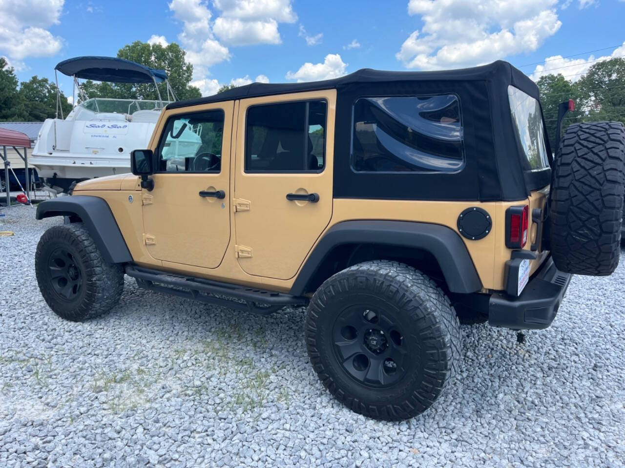 2014 Jeep Wrangler Unlimited for sale at YOUR CAR GUY RONNIE in Alabaster, AL