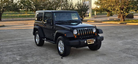 2012 Jeep Wrangler for sale at America's Auto Financial in Houston TX