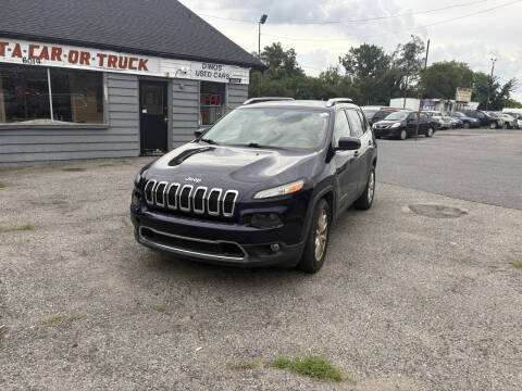 2015 Jeep Cherokee for sale at Dino's Used Car Lot in Riverdale Park MD