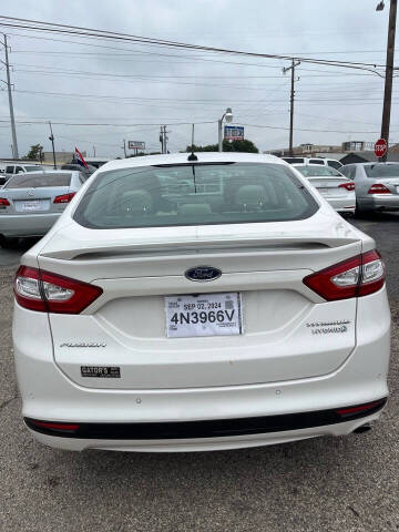 2014 Ford Fusion Hybrid for sale at Gator's Auto Sales in Garland TX