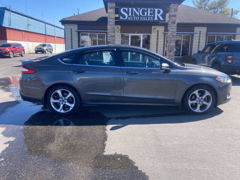 2015 Ford Fusion for sale at Singer Auto Sales in Caldwell OH