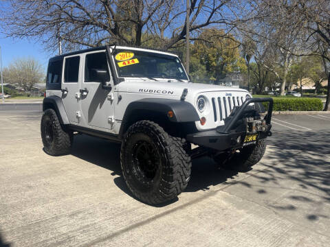 2012 Jeep Wrangler Unlimited for sale at Devine Auto Sales in Modesto CA