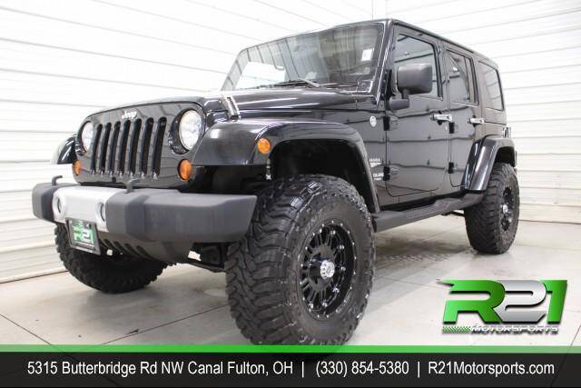 2011 Jeep Wrangler Unlimited for sale at Route 21 Auto Sales in Canal Fulton OH