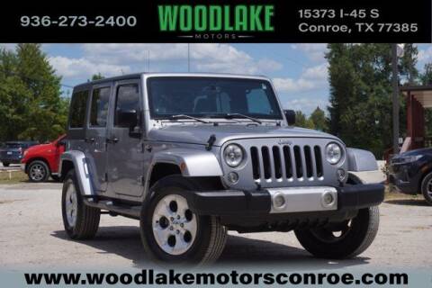 2014 Jeep Wrangler Unlimited for sale at WOODLAKE MOTORS in Conroe TX