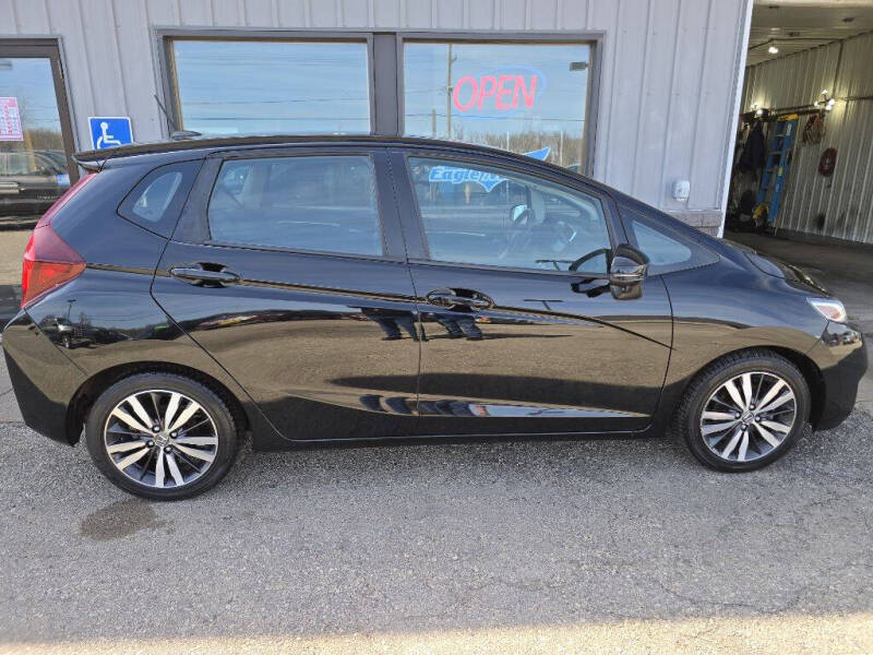 Used 2016 Honda Fit EX-L with VIN 3HGGK5H94GM703943 for sale in La Crescent, Minnesota