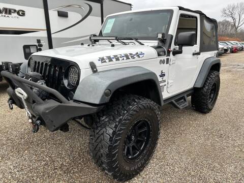 2013 Jeep Wrangler for sale at TIM'S AUTO SOURCING LIMITED in Tallmadge OH