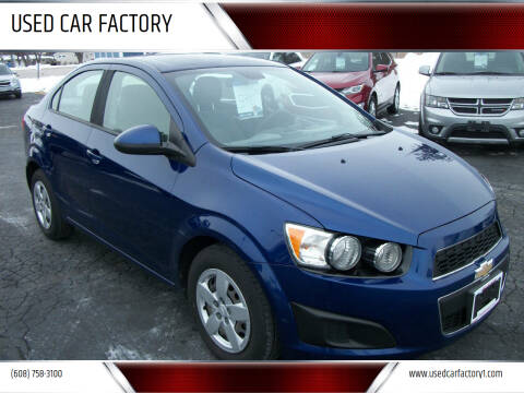 2013 Chevrolet Sonic for sale at USED CAR FACTORY in Janesville WI