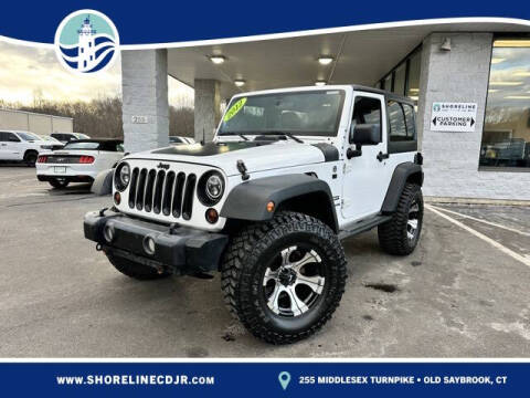 2012 Jeep Wrangler for sale at International Motor Group - Shoreline Chrysler Jeep Dodge Ram in Old Saybrook CT