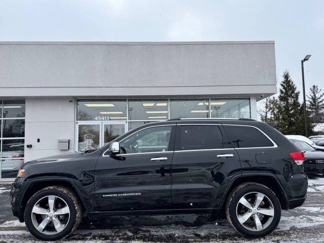 2015 Jeep Grand Cherokee for sale at Opus Motorcars in Utica, MI