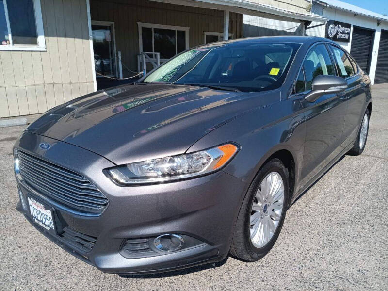 Used 2014 Ford Fusion SE Hybrid with VIN 3FA6P0LU5ER186197 for sale in Clovis, CA