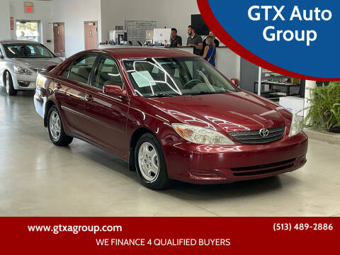 2003 Toyota Camry for sale at UNCARRO in West Chester OH