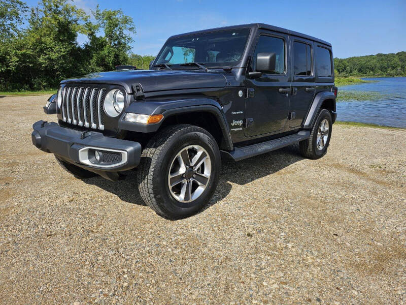 2020 Jeep Wrangler Unlimited for sale at Rombaugh's Auto Sales in Battle Creek MI