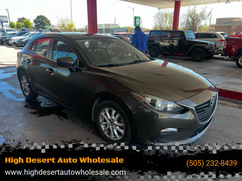 2014 Mazda MAZDA3 for sale at High Desert Auto Wholesale in Albuquerque NM