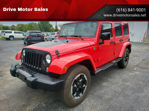 2014 Jeep Wrangler Unlimited for sale at Drive Motor Sales in Ionia MI