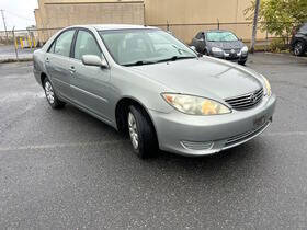 2006 Toyota Camry for sale at American & Import Automotive in Cheektowaga NY