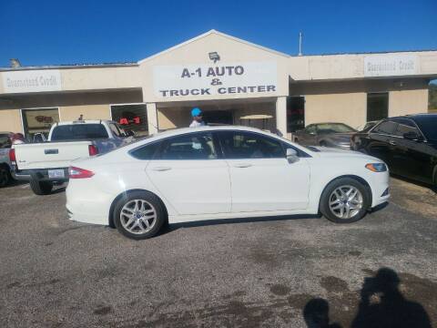 2013 Ford Fusion for sale at A-1 AUTO AND TRUCK CENTER in Memphis TN