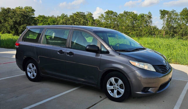 2014 Toyota Sienna for sale at CAR MARKET AUTO GROUP in Sugar Land, TX