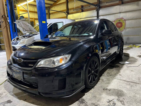 2013 Subaru Impreza for sale at BELOW BOOK AUTO SALES in Idaho Falls ID