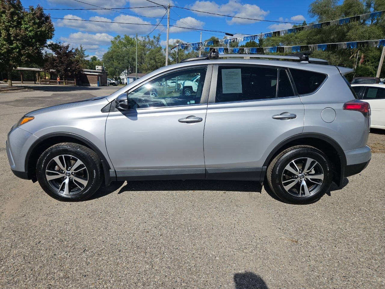 2017 Toyota RAV4 for sale at DANGO AUTO SALES in HOWARD CITY, MI