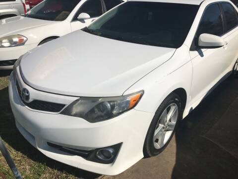 2012 Toyota Camry for sale at Simmons Auto Sales in Denison TX