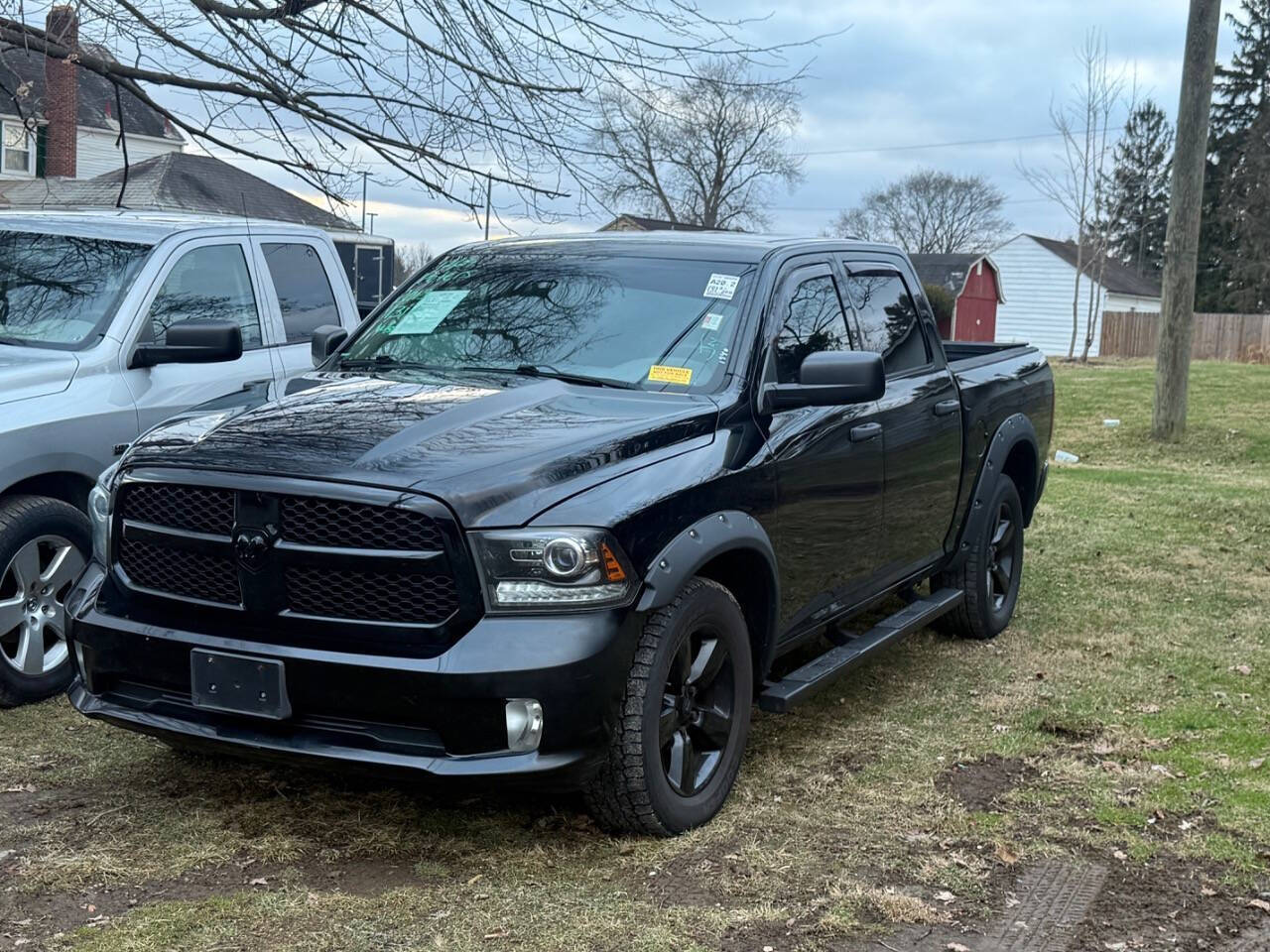 2013 RAM 1500 Express 4x4 4dr Crew Cab 5.5 ft. SB Pickup's photo