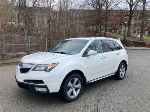 2011 Acura MDX for sale at STIRLING MOTORS, LLC in Irwin PA