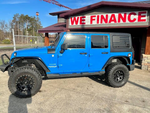 2011 Jeep Wrangler Unlimited for sale at Affordable Auto Sales in Cambridge MN