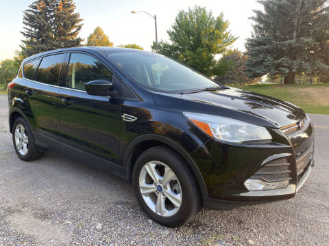 2013 Ford Escape for sale at BELOW BOOK AUTO SALES in Idaho Falls ID