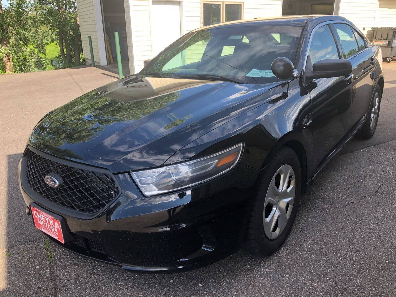 2015 Ford Taurus for sale at Cheyka Motors in Schofield, WI