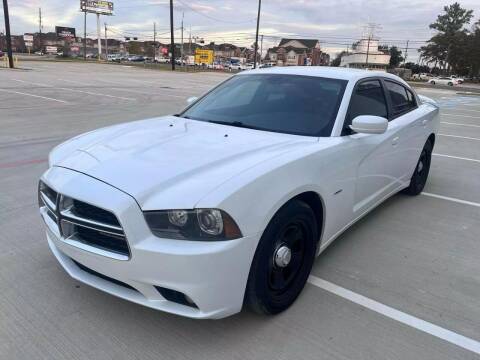 2014 Dodge Charger for sale at TEXAS MOTOR CARS in Houston TX