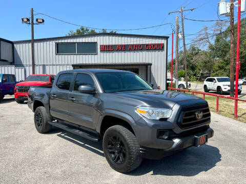 2021 Toyota Tacoma for sale at Mill Auto Group LLC in Conroe TX