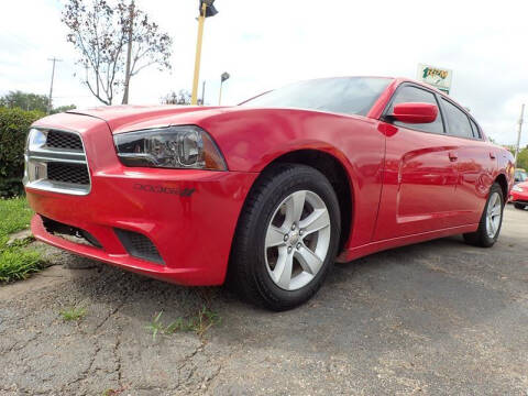 2011 Dodge Charger for sale at RPM AUTO SALES in Lansing MI