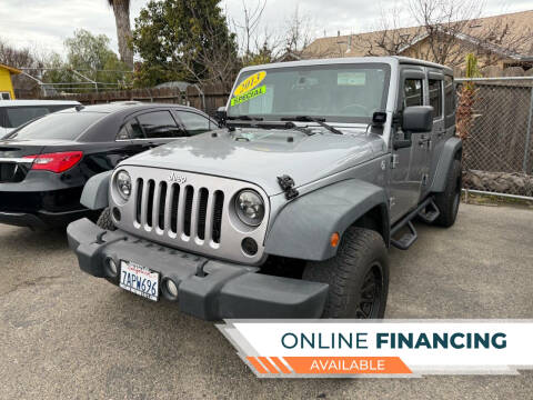 2013 Jeep Wrangler Unlimited for sale at Freeway Motors Used Cars in Modesto CA