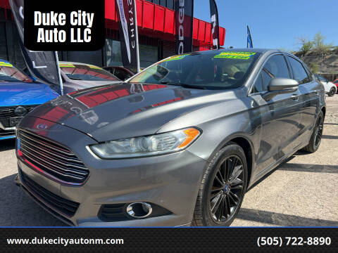 2014 Ford Fusion for sale at Duke City Auto LLC in Gallup NM