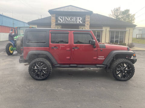 2012 Jeep Wrangler Unlimited for sale at Singer Auto Sales in Caldwell OH