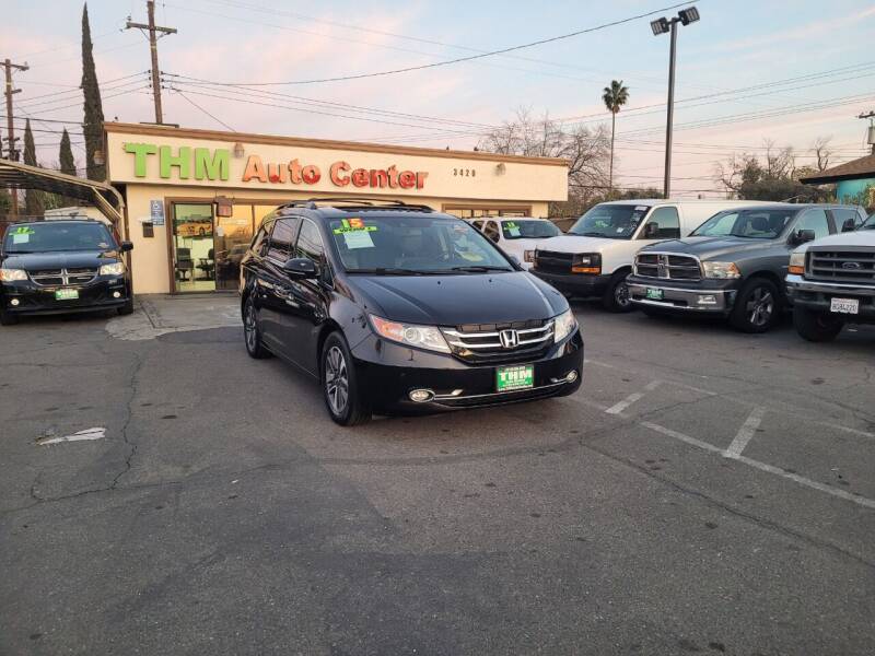 2015 Honda Odyssey for sale at THM Auto Center in Sacramento CA