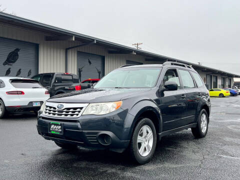 2013 Subaru Forester for sale at DASH AUTO SALES LLC in Salem OR