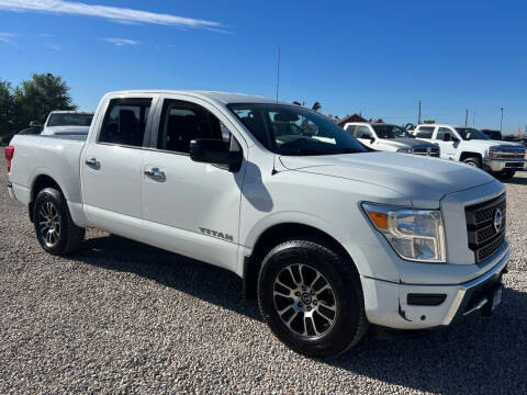 2021 Nissan Titan for sale at BERKENKOTTER MOTORS in Brighton CO