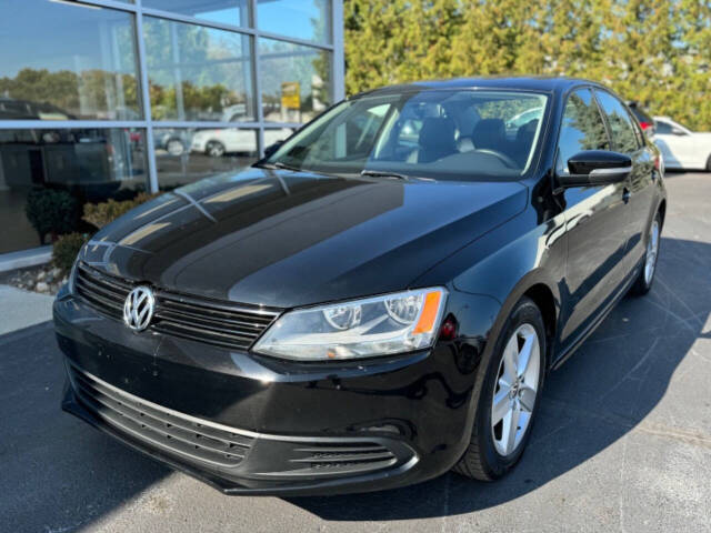 2012 Volkswagen Jetta for sale at Opus Motorcars in Utica, MI