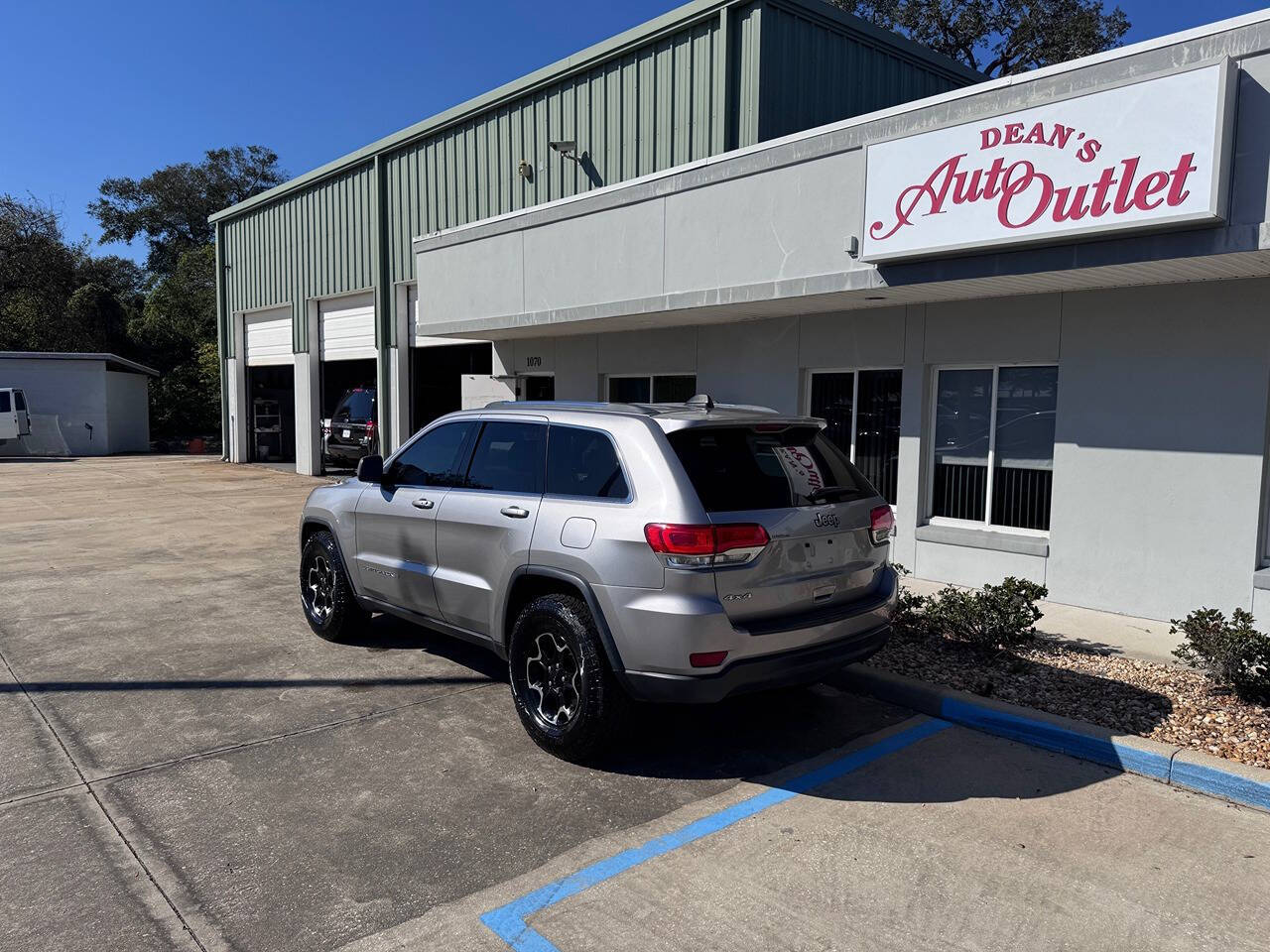 2015 Jeep Grand Cherokee for sale at Deans Auto Outlet in Ormond Beach, FL